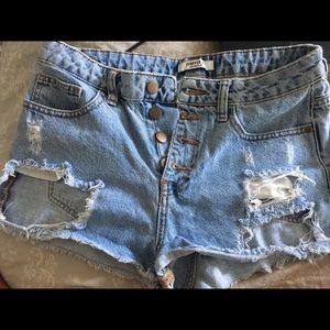 High rise distressed denim shorts